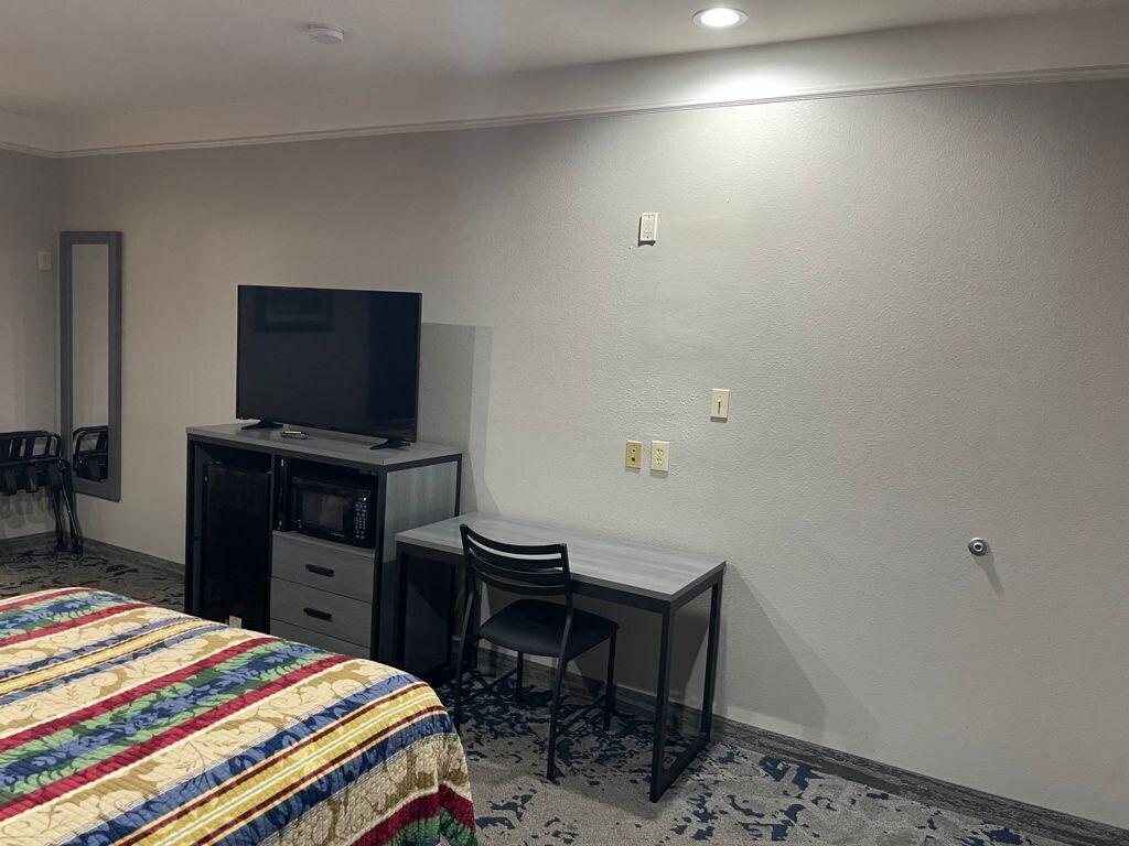 Scottish Inn And Suites Элвин Экстерьер фото